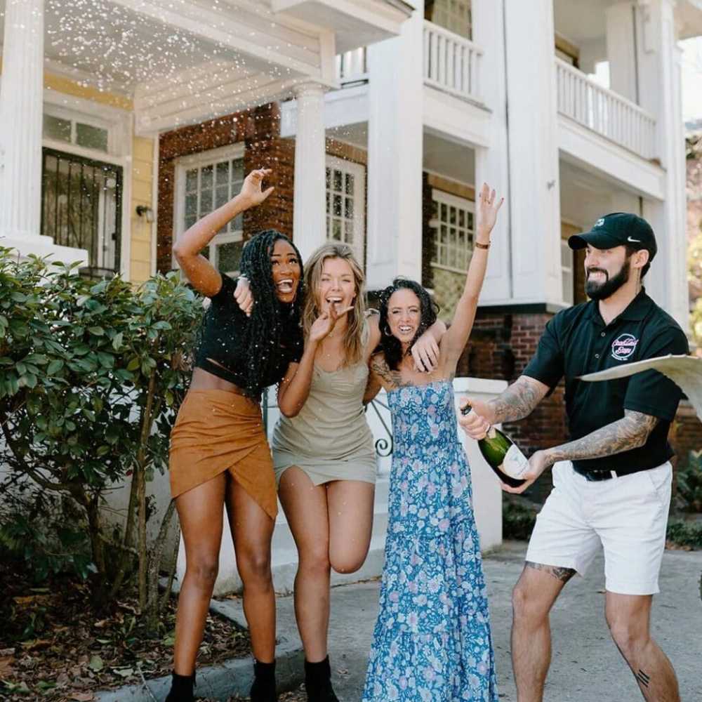 a group of people standing in front of a building