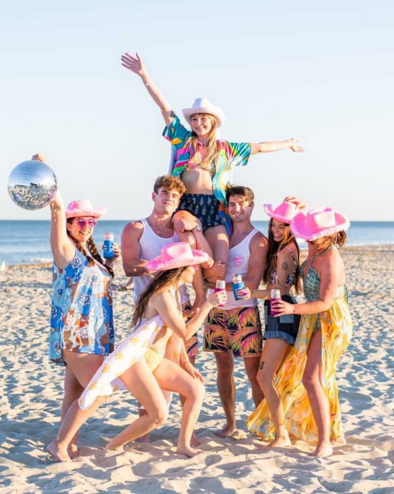 a group of people on a beach