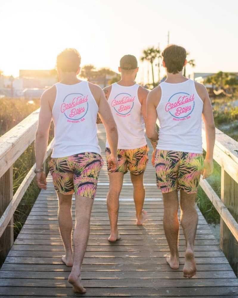 a group of people standing on a dock