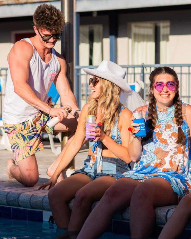 a group of people sitting on a bench