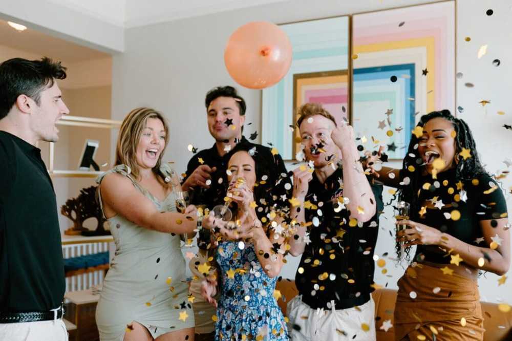 a group of people standing in a room