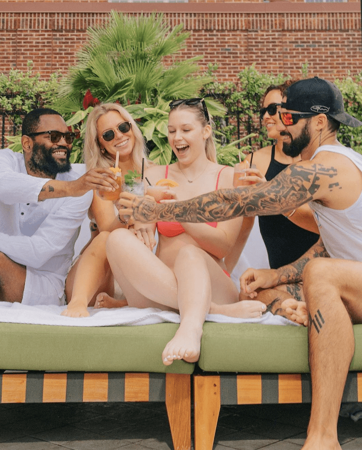 a group of people sitting on a bench