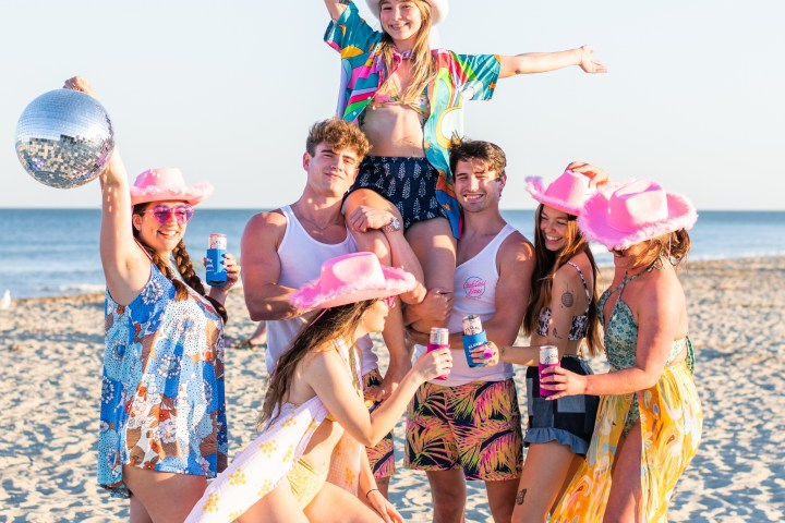 a group of people on a beach