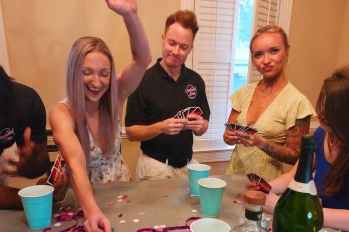 a group of people sitting at a table