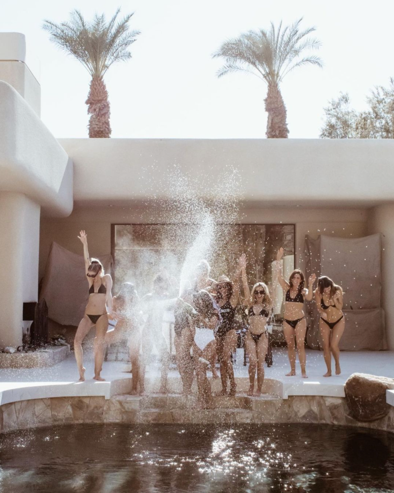 a fountain with people in the water