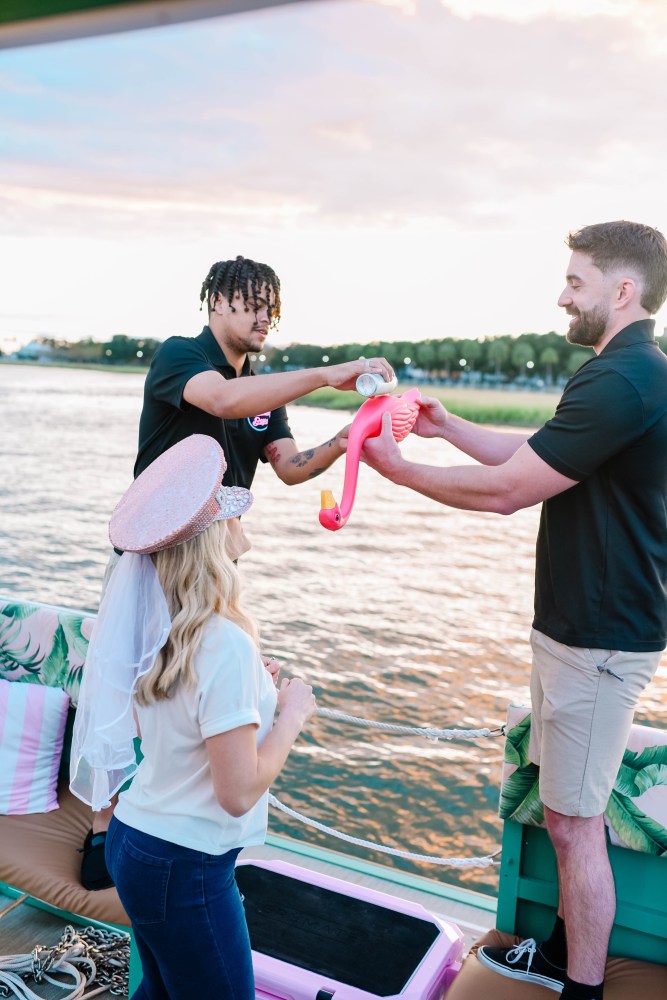 a couple of people that are standing in the water