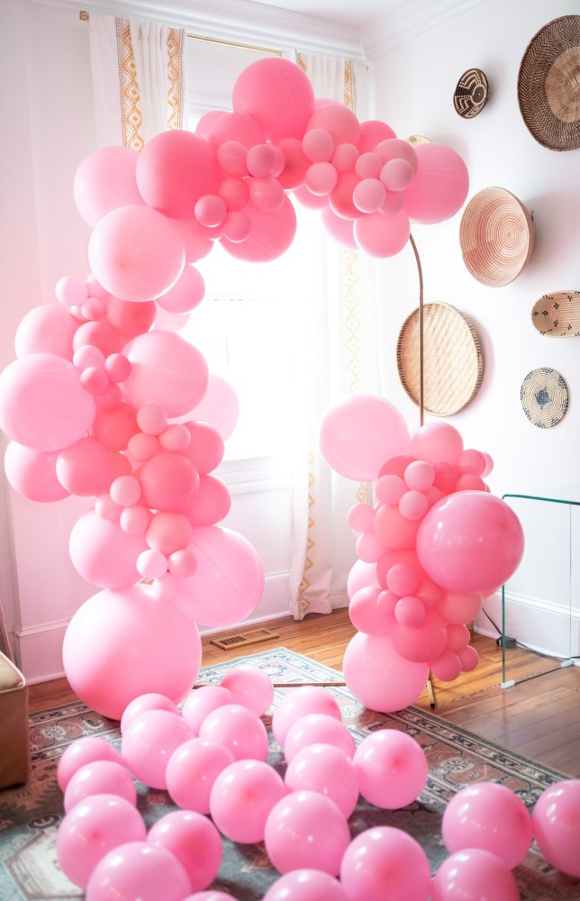 a group of pink flowers on a table